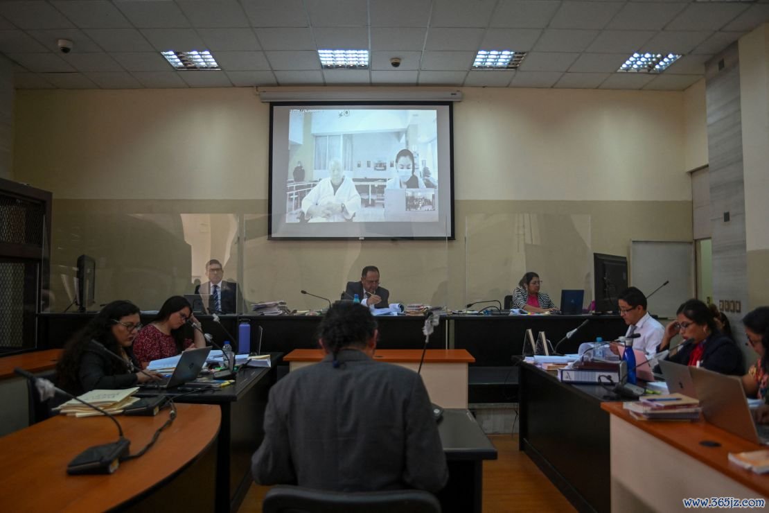 Retired General Benedicto Lucas Garcia (91) is seen on a screen during a video call from the ward of a military hospital where he is being held during his hearing at court in Guatemala City on April 5, 2024.